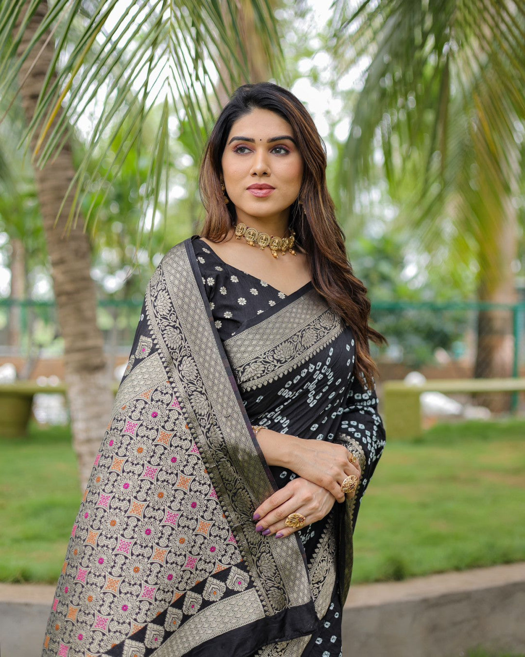 Black Color Hand Bandhej Silk Saree With Zari Weaving Work