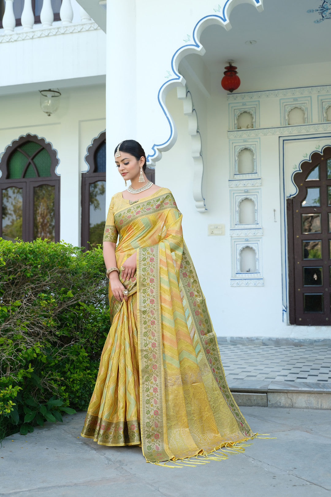 Yellow Color Soft Organza Silk Saree With Zari Weaving Work