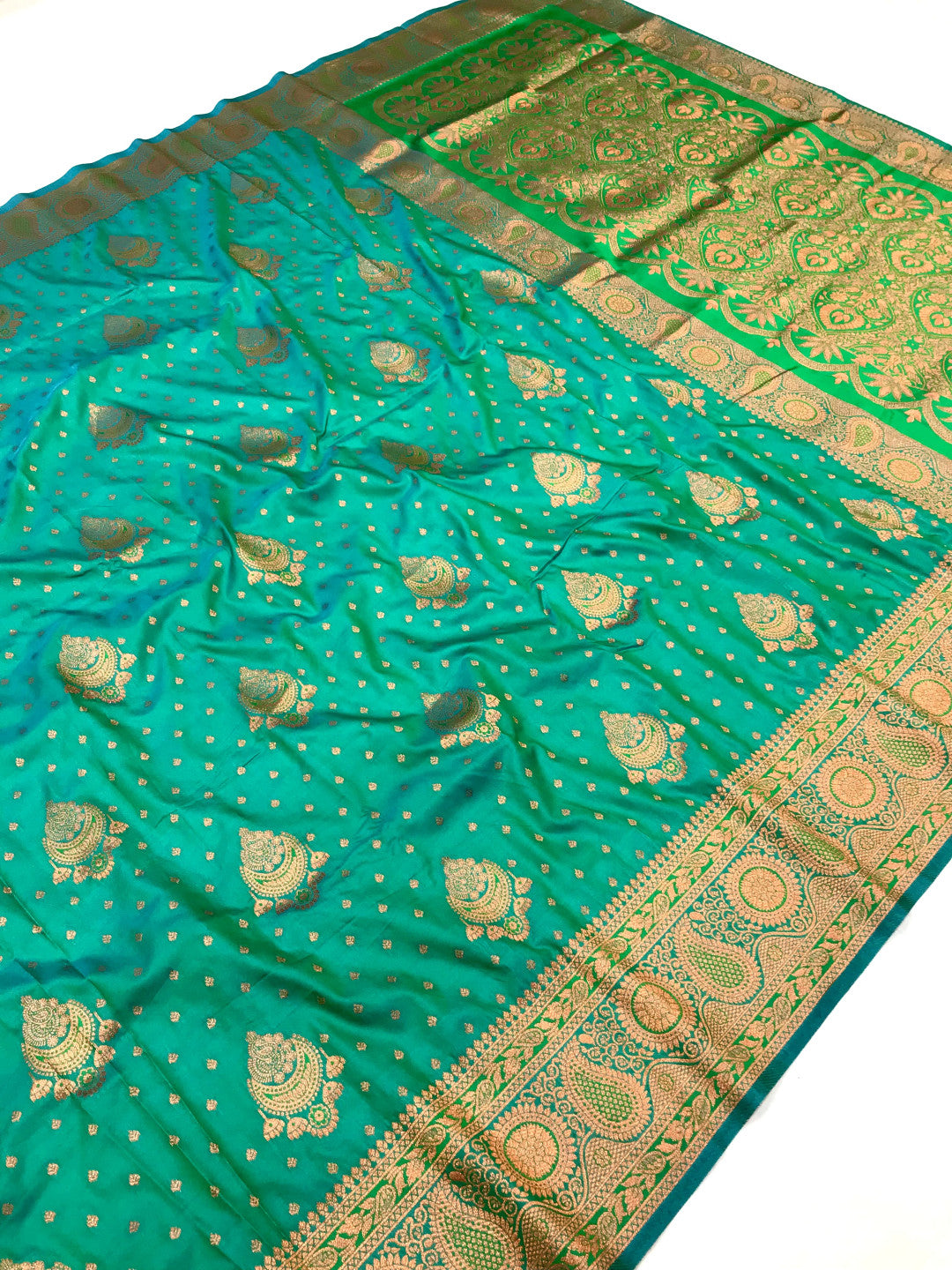 Rama Green Elegant Banarasi Silk Saree With Copper Zari Woven Work