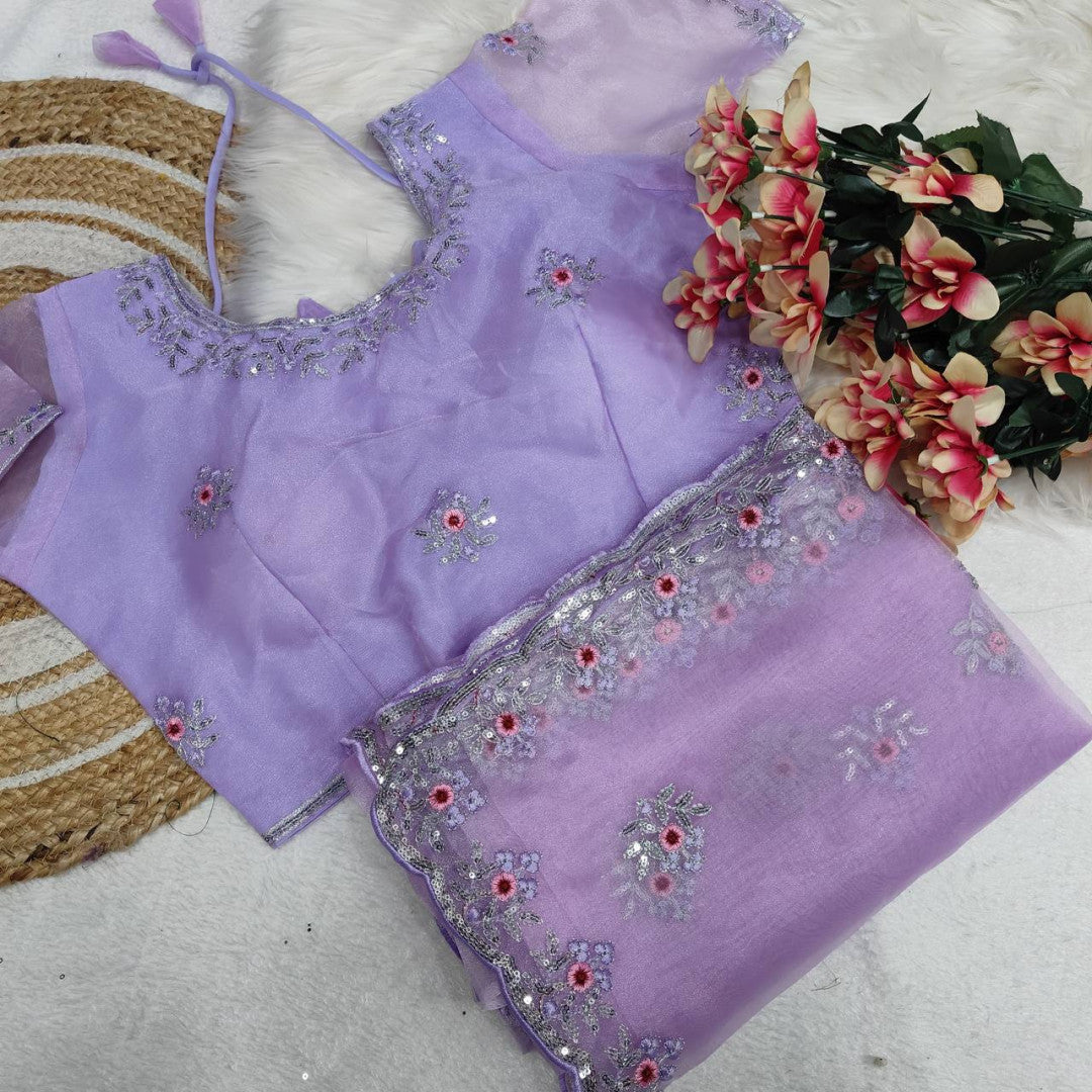 Lavender Organza Silk Saree With Sequence Embroidery Work And Arco Cut Border With Readymade Blouse