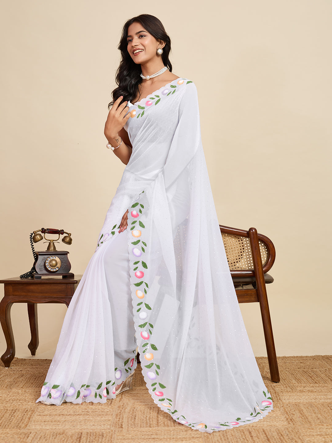 White Color Georgette Saree With Brush Print And Siroski Work