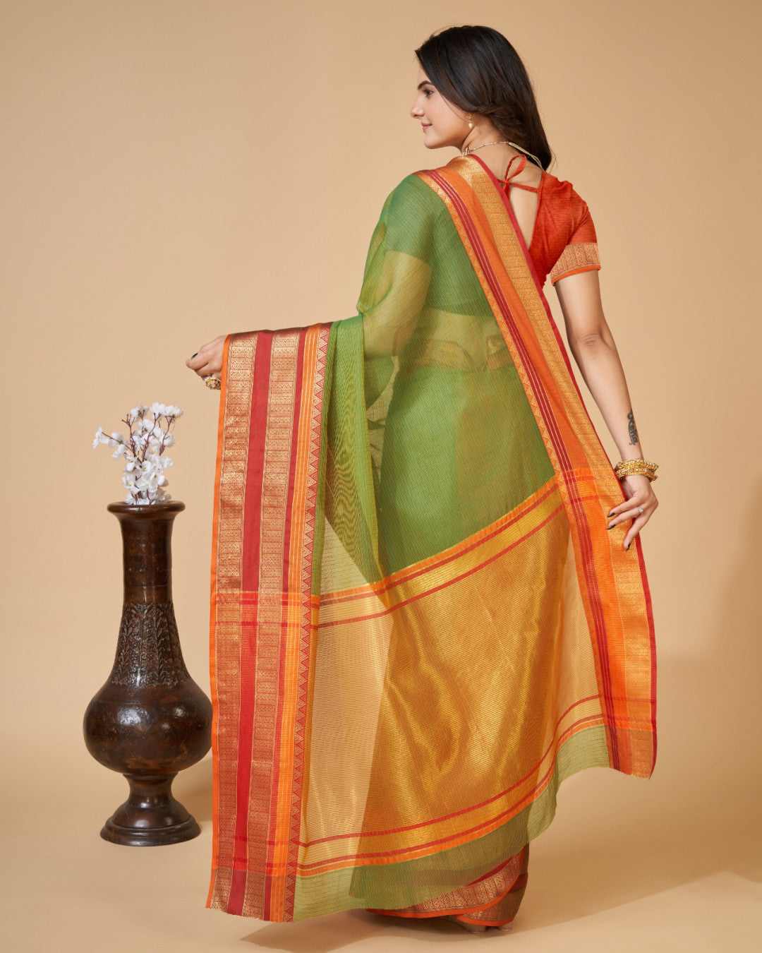 Mahendi Green Color Kota Doriya Saree With Zari Weaving Work