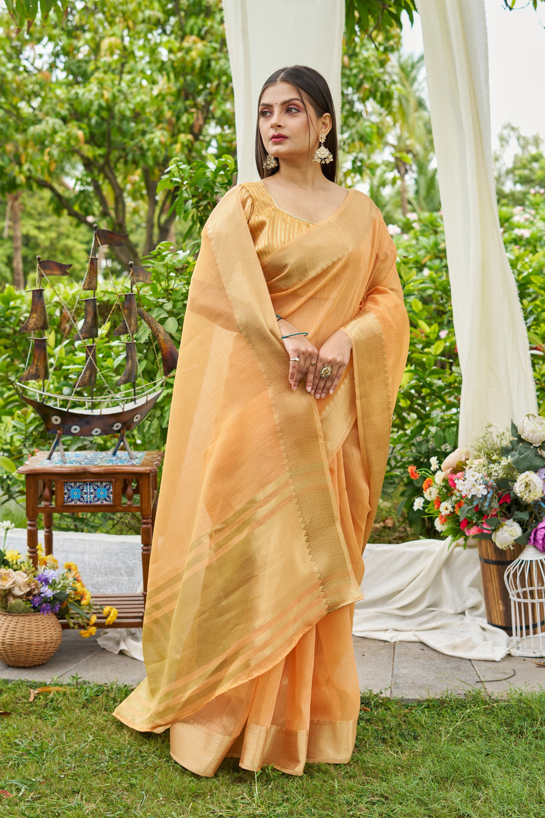 Orange Color Linen Cotton Saree With Zari Weaving Border