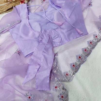 Lavender Organza Silk Saree With Sequence Embroidery Work And Arco Cut Border With Readymade Blouse