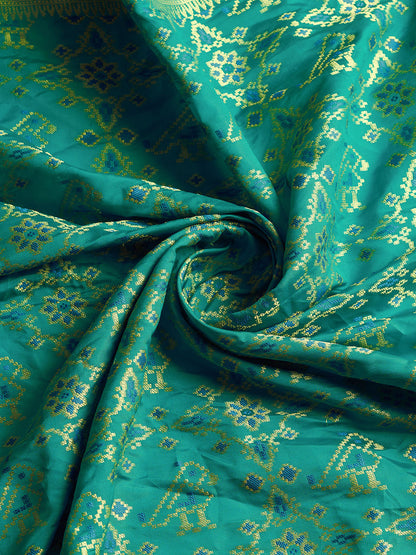 Rama Green Color Patola Silk Saree With Zari Weaving Work