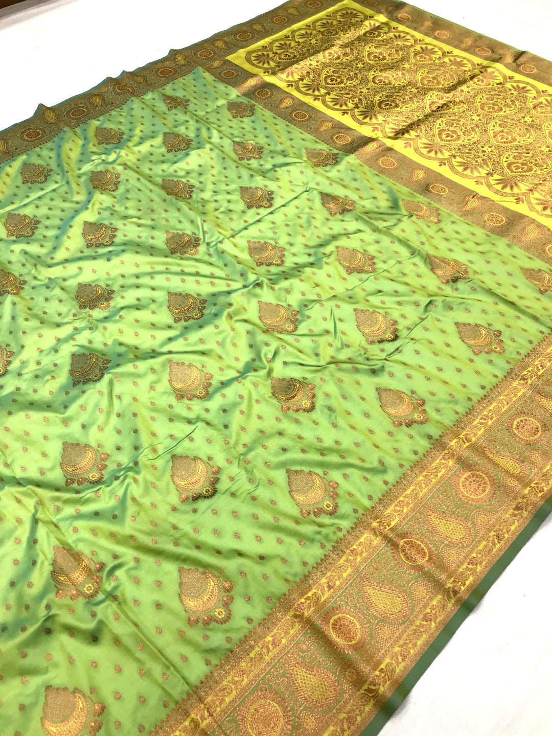 Pista Green Elegant Banarasi Silk Saree With Copper Zari Woven Work