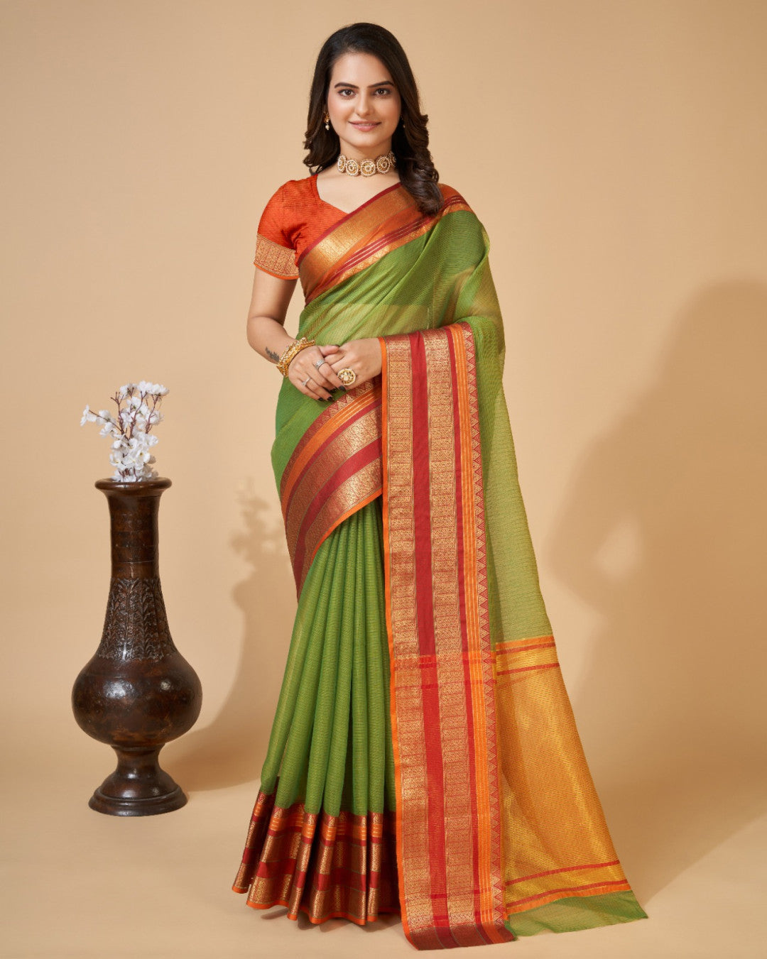 Mahendi Green Color Kota Doriya Saree With Zari Weaving Work