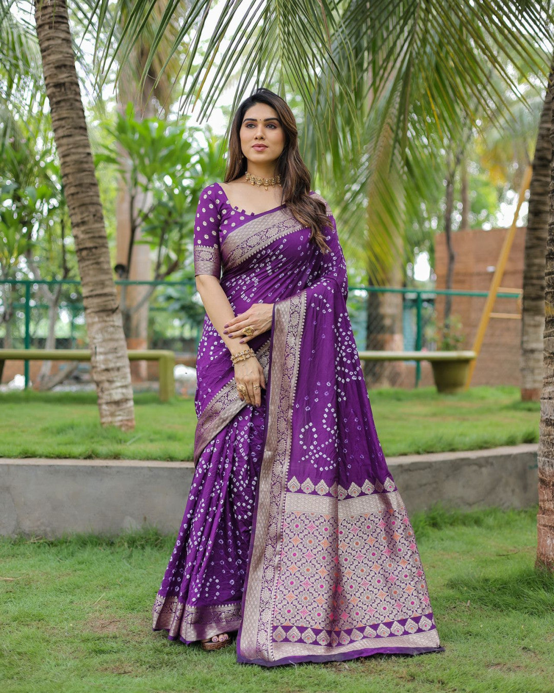 Purple Color Hand Bandhej Silk Saree With Zari Weaving Work