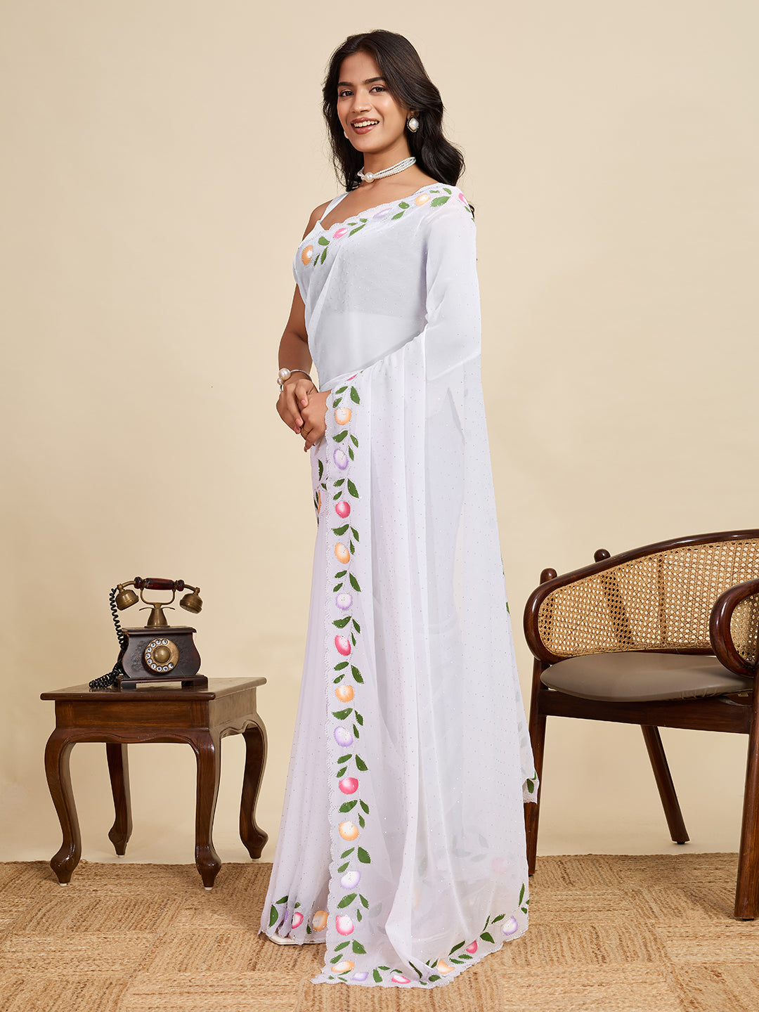 White Color Georgette Saree With Brush Print And Siroski Work