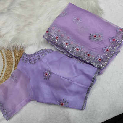 Lavender Organza Silk Saree With Sequence Embroidery Work And Arco Cut Border With Readymade Blouse