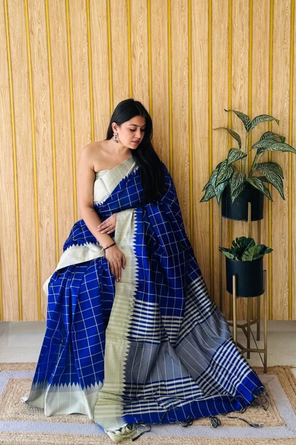 Blue raw silk saree with weaving temple border