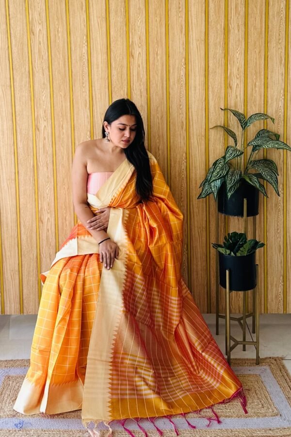 Mustard yellow raw silk saree with weaving temple border