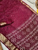 Magenta Dola Silk Bandhej Saree With Zari Border